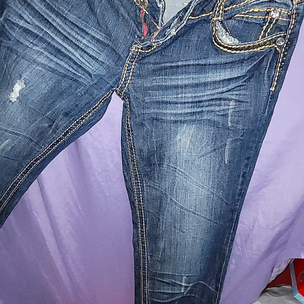 2 Pairs of Almost Famous Jeans size 11, for $21